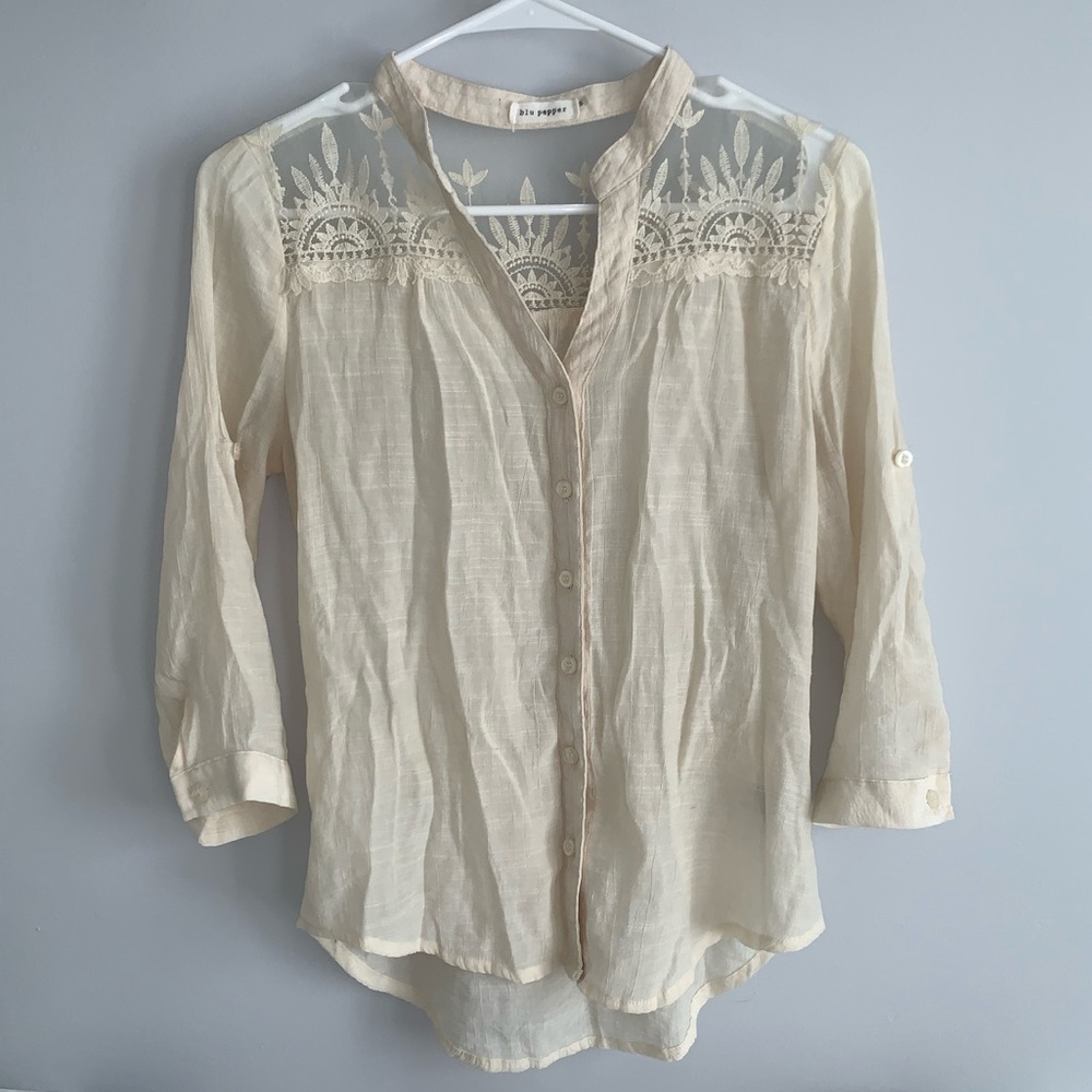 Sheer lace detailed button down blouse.